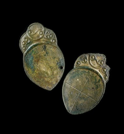 Pair of spoons with cast decoration, from a site at Penbryn, Ceredigion, Wales, Iron Age by Iron Age